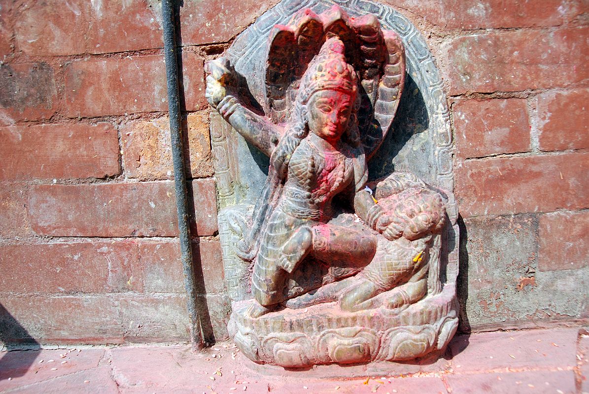58 Kathmandu Gokarna Mahadev Temple Female Statue With Knee In Stomach Of Man 